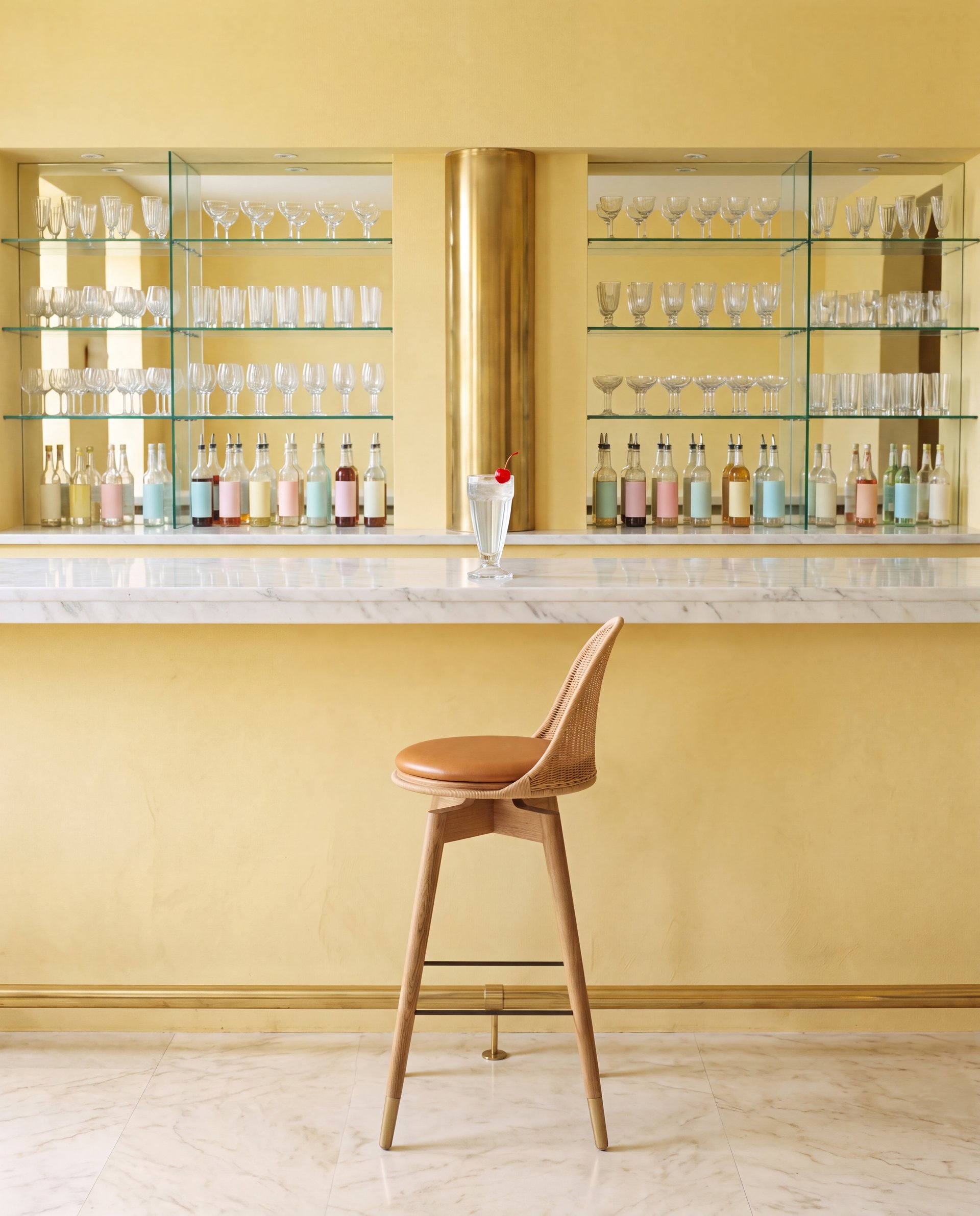 Oka Rattan Swivel Bar Stool